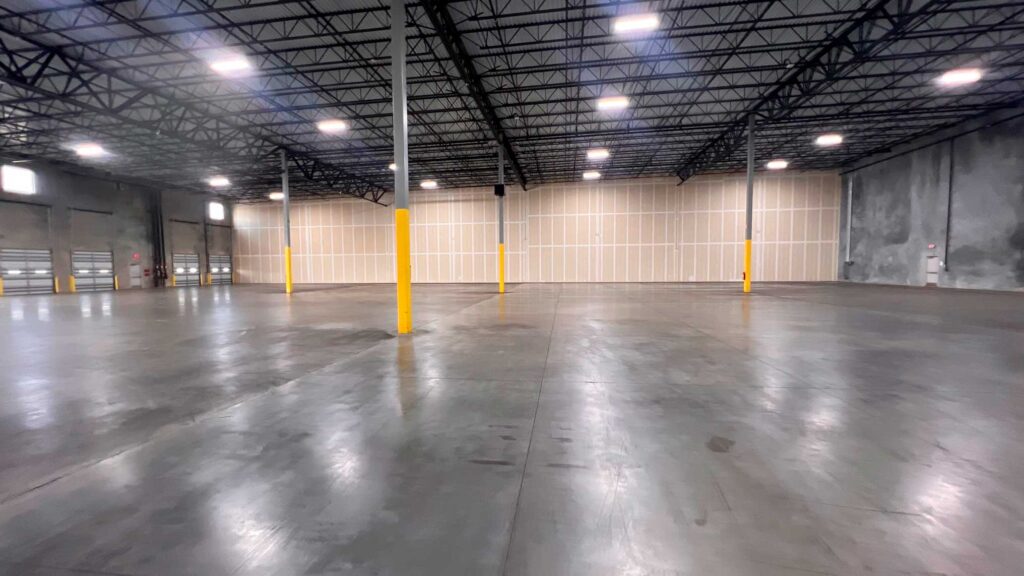 New Houston Location Empty industrial warehouse interior of DC Export